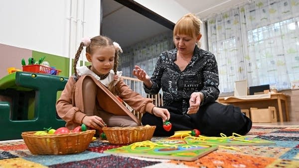 The government is spending less on kids. That comes with a cost.