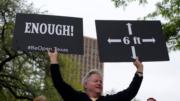 A protester demonstrates during the "Reopen America" rally on April 18, 2020 at the State Capitol in Austin, Texas.