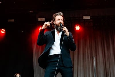 Father John Misty and band on stage