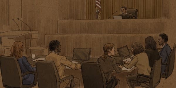 A courtroom sketch of a court scene.