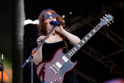 Die Spitz performing on an outdoor stage.