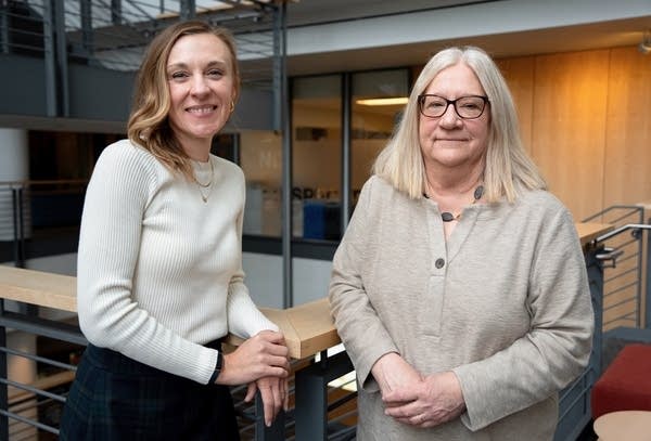 Two women posing for a portrait