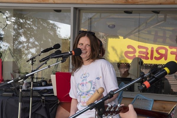 Ber performs at the MPR booth at the Minnesota State Fair