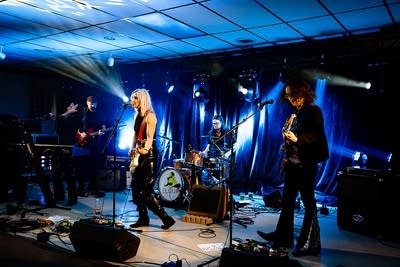 A band performing onstage