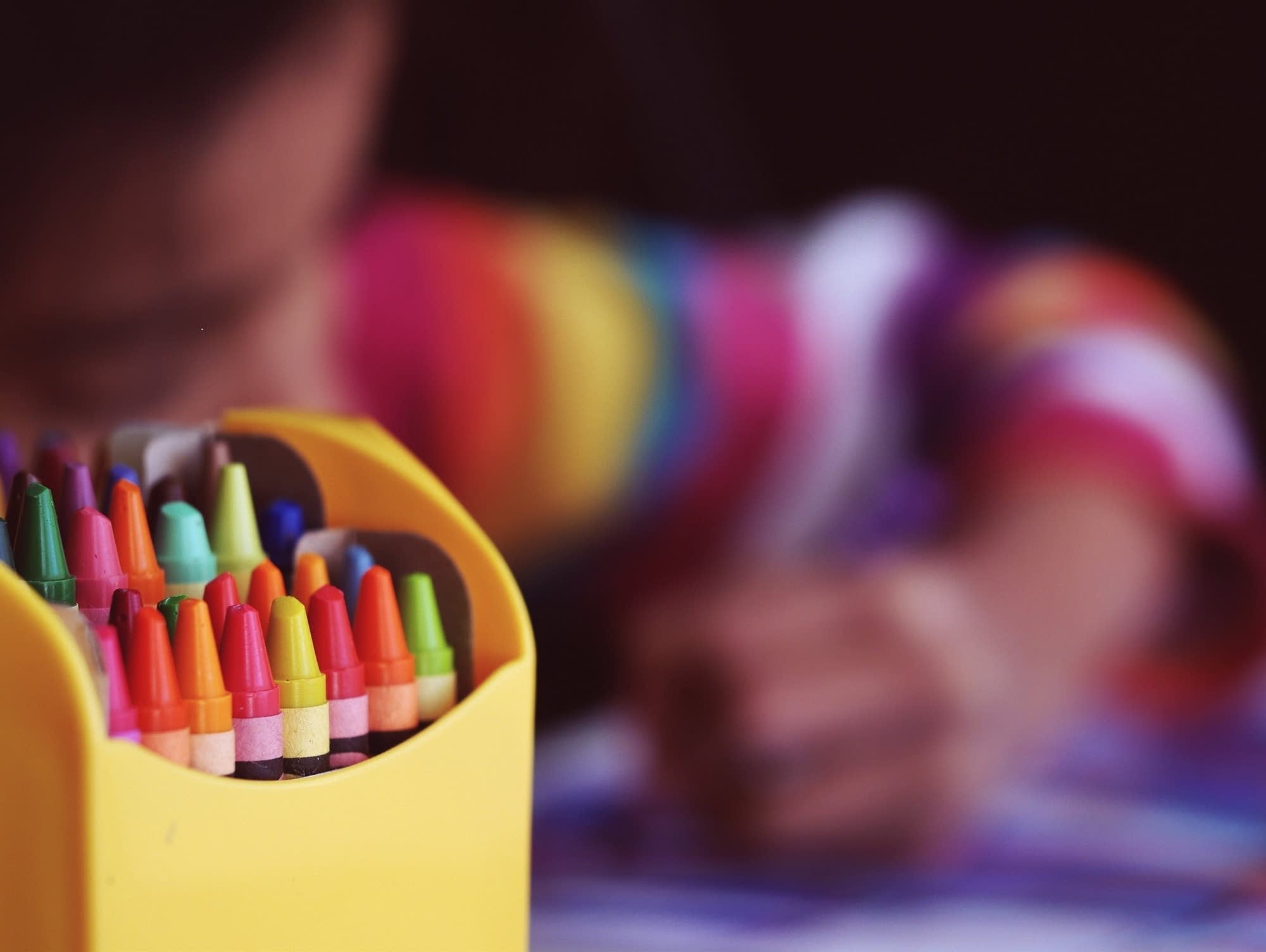 Preschooler with crayons