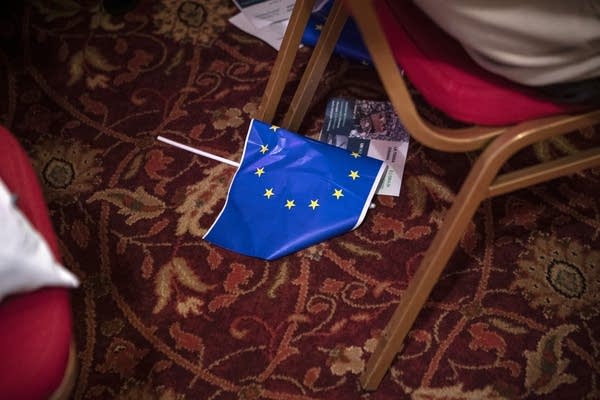 A discarded flag of the European Union is pictured on the floor of a conference room during the 2019 +Europa founding congress (Photo by Emanuele Cremaschi/Getty Images).
