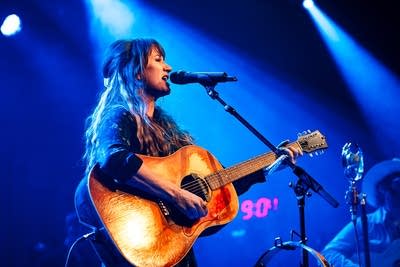Margo Price performing on stage