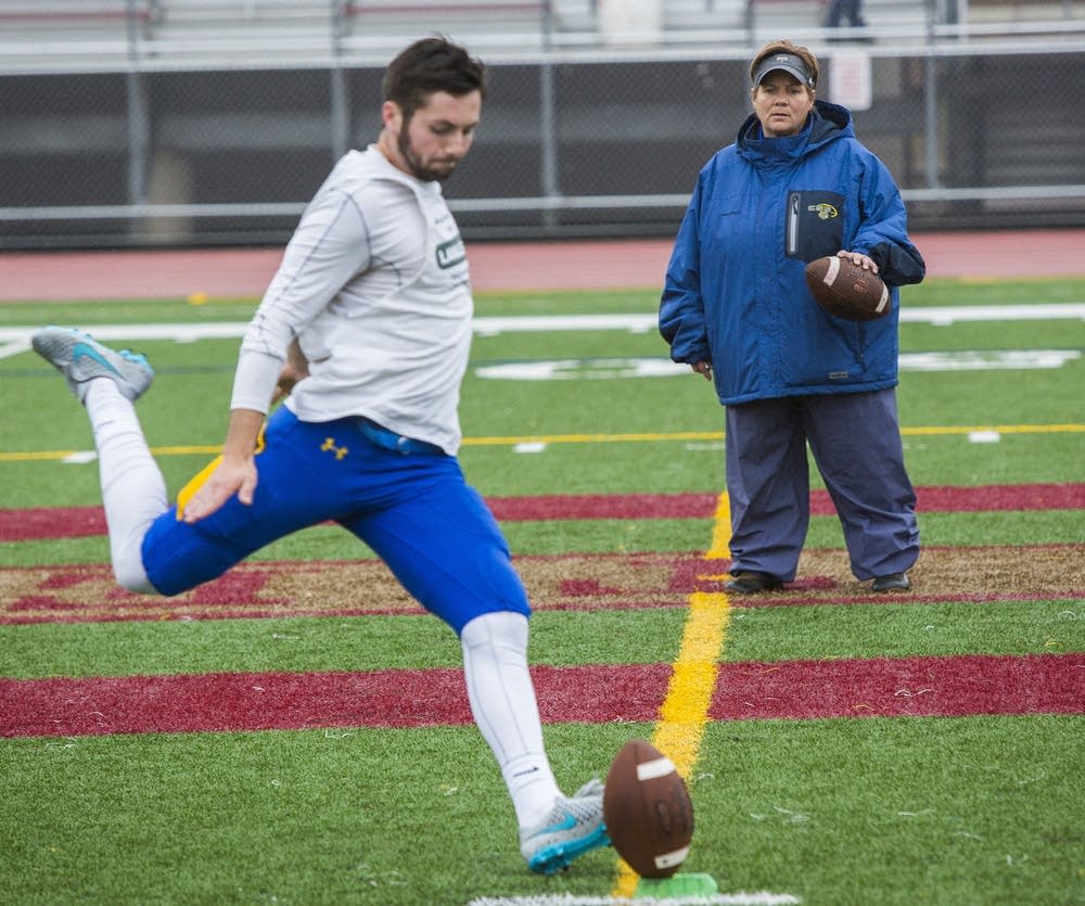 Maurer runs kicker through drills.