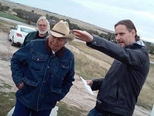 Actor Dave Bald Eagle listens as director Steven Lewis Simpson