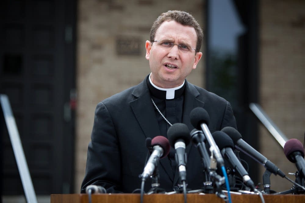 Auxiliary Bishop Andrew Cozzens reads statement