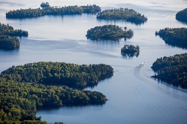 A boat passes through a channel in Voyageurs.