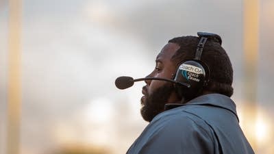 Charles Adams III watches a play during