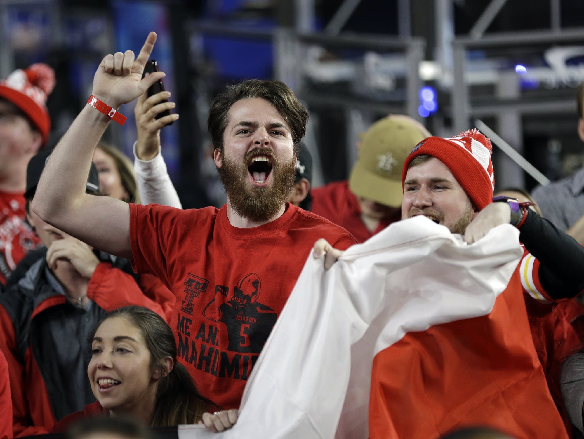 Texas Tech fans cheer before their team's Final Four semifinal