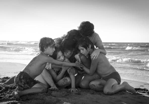 Yalitza Aparicio, center, in a scene from the film 'Roma.'