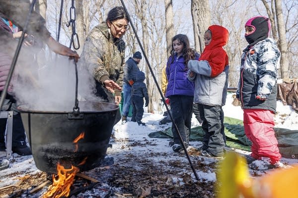 A school field trip to skigamizigan (sugar bushing) Camp 