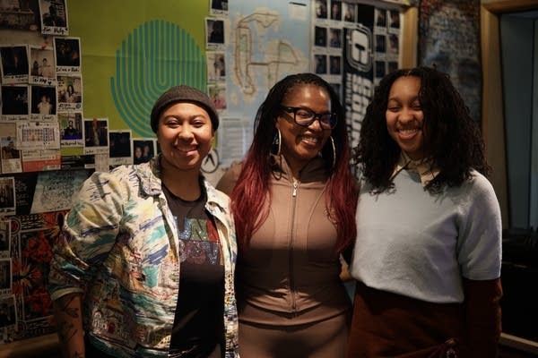 Cadence, Sanni, and Mattie posing for a photo in the carbon sound studio