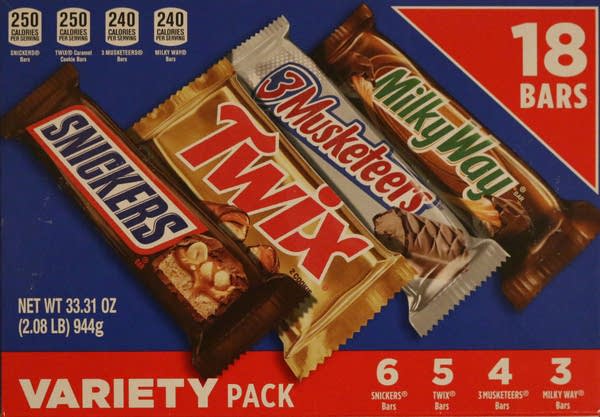 A variety pack of full-sized candy bars featuring Snickers, Twix, 3 Musketeers and Milky Way. The price per ounce for this box of chocolates rose from 40 cents to 69 cents between 2020 and 2026, according to a comparison of Walmart.com listings. 