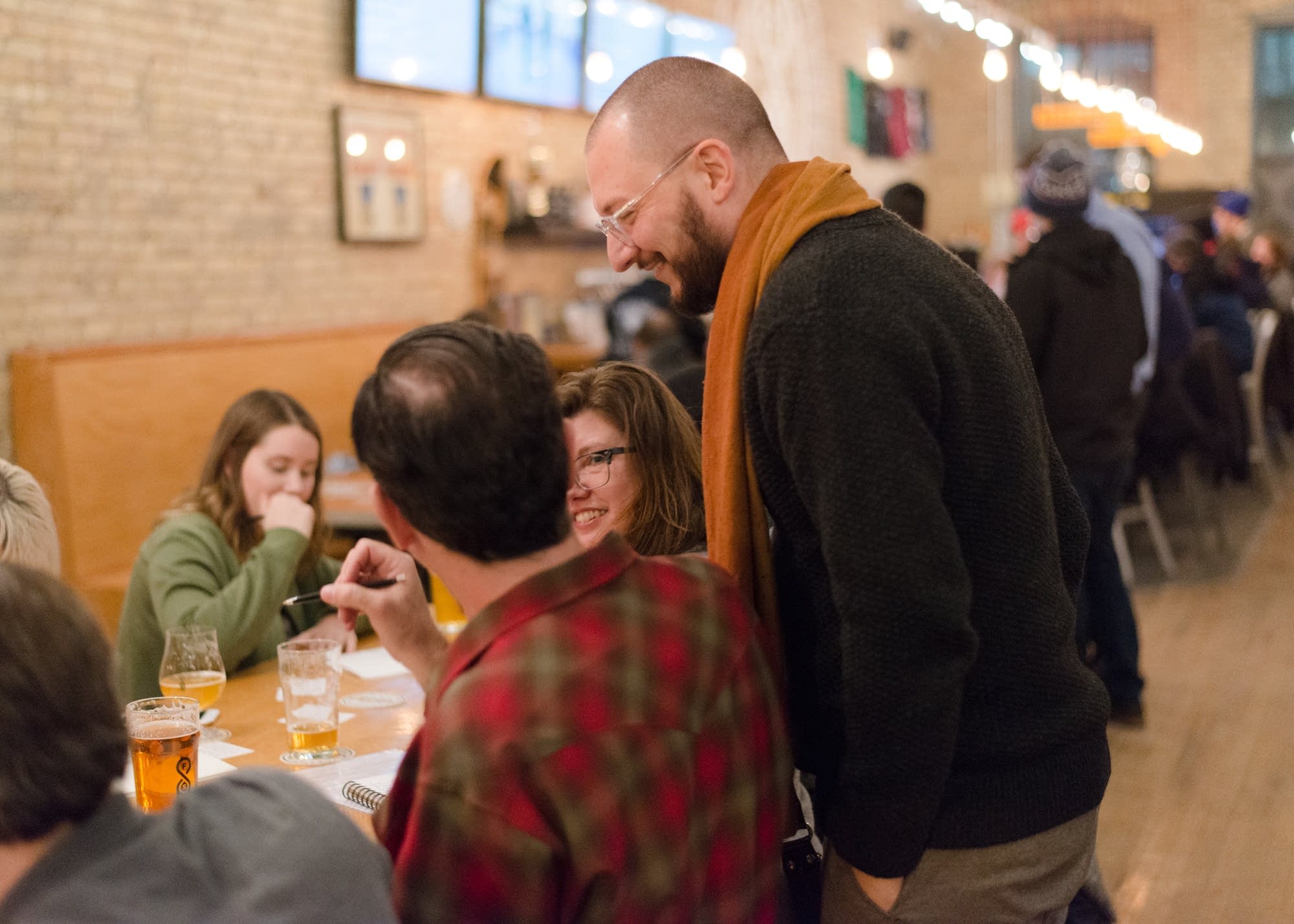 Loop Haro talks with members of the group Tiny Motor Things.