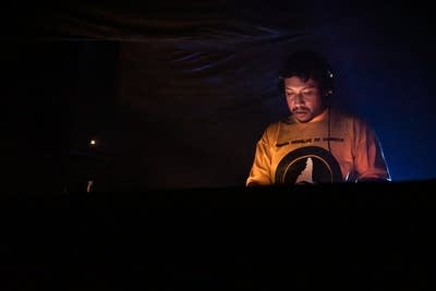 a person djing on stage