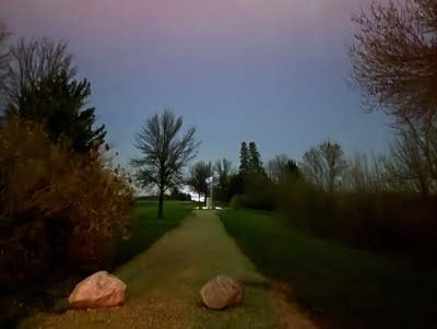 Greens and reds fill the night sky.