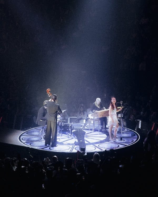 Laufey performing on stage