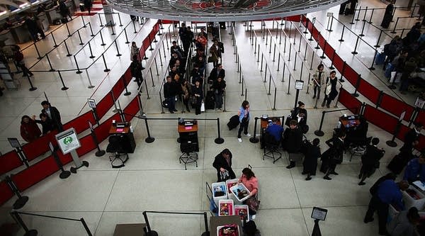 Traveling through John F. Kennedy Airport in New York City may be more convenient, but lines are longer.