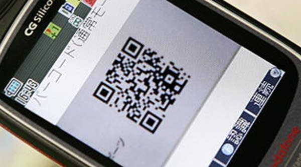 This photo taken March 11, 2005, shows a 'QR Code' being displayed in a camera-equipped mobile phone in Tokyo. QR Code allows users to enter text information such as name and address on a name card, Internet URL or e-mail address, into mobile phones easily and quickly.