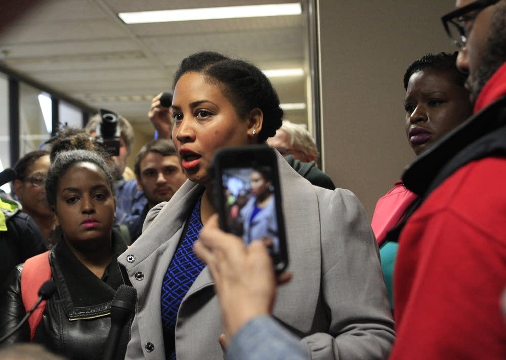 Raeisha Williams talks with reporters.