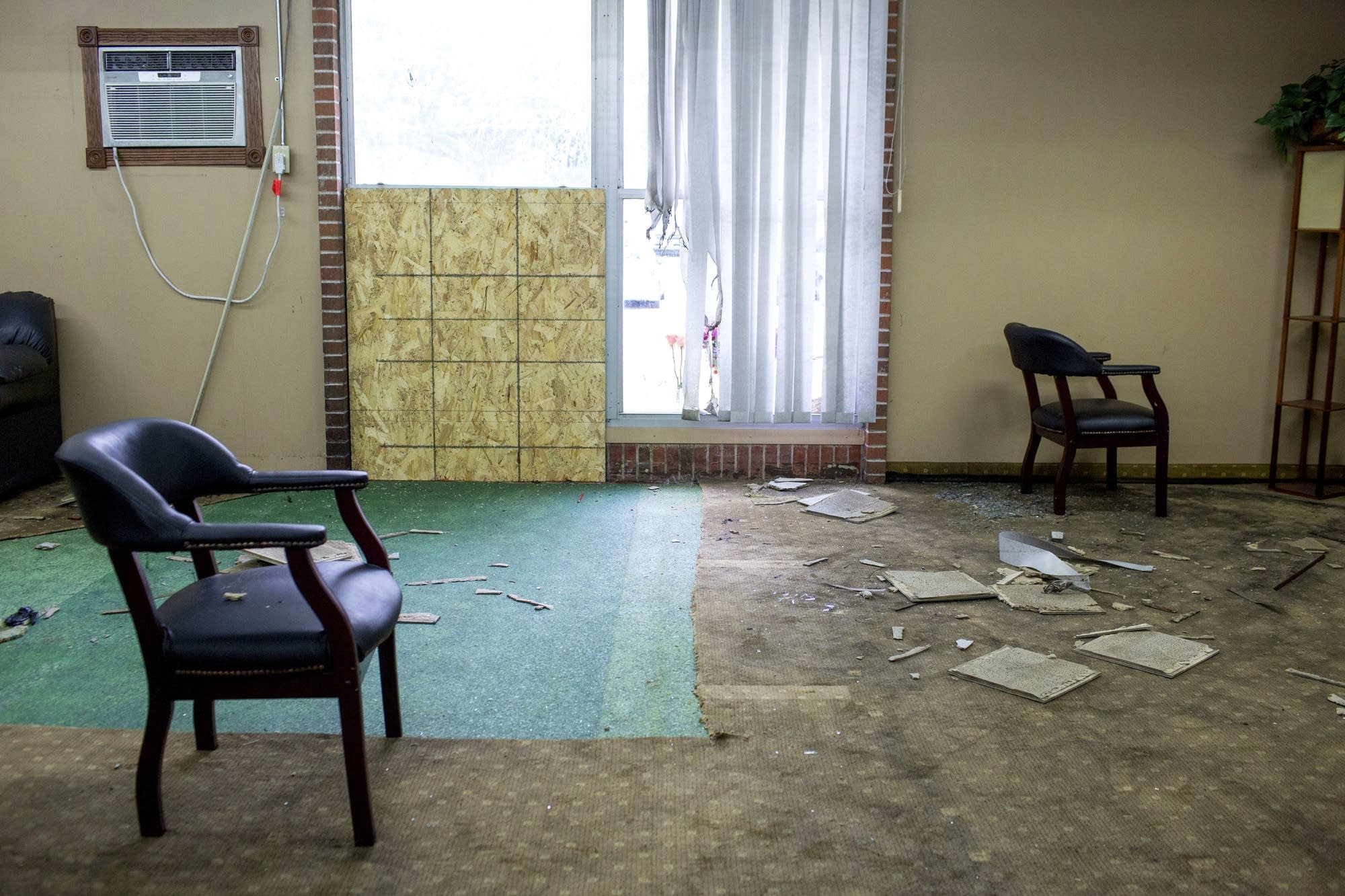Debris is scattered around a room inside the Dar Al Farooq Islamic Center.