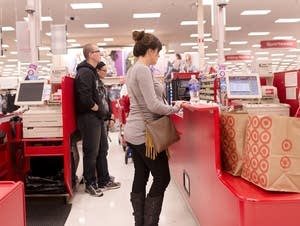 Jenny Kipka waits at the checkout line.