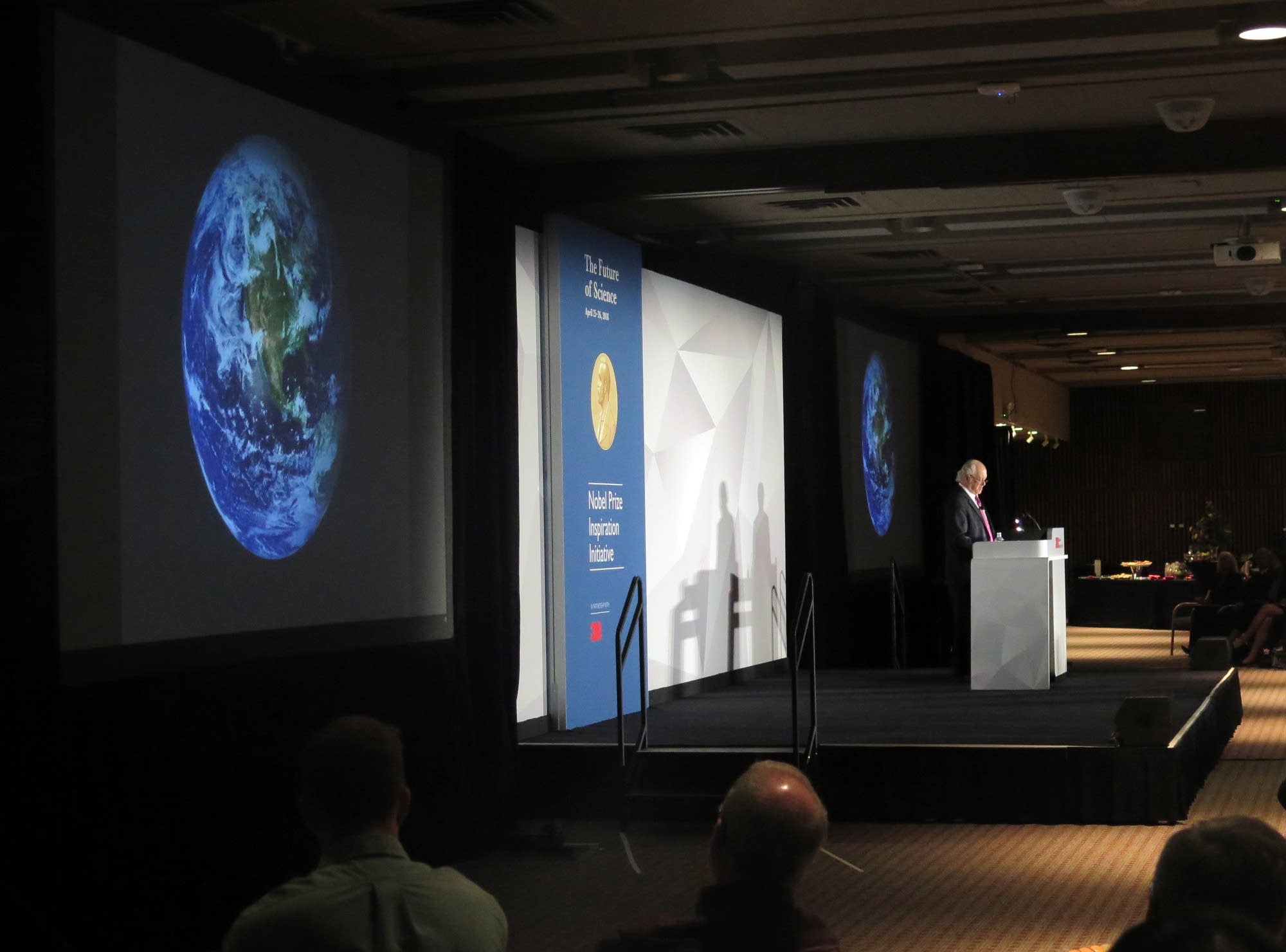 Mario Molina speaks to a group of scientists and college students at 3M.
