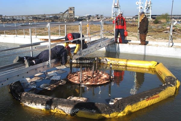 Researchers fit the Flame Refluxer with coils for a test burn