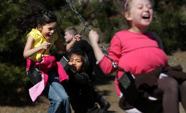 Swinging on playground