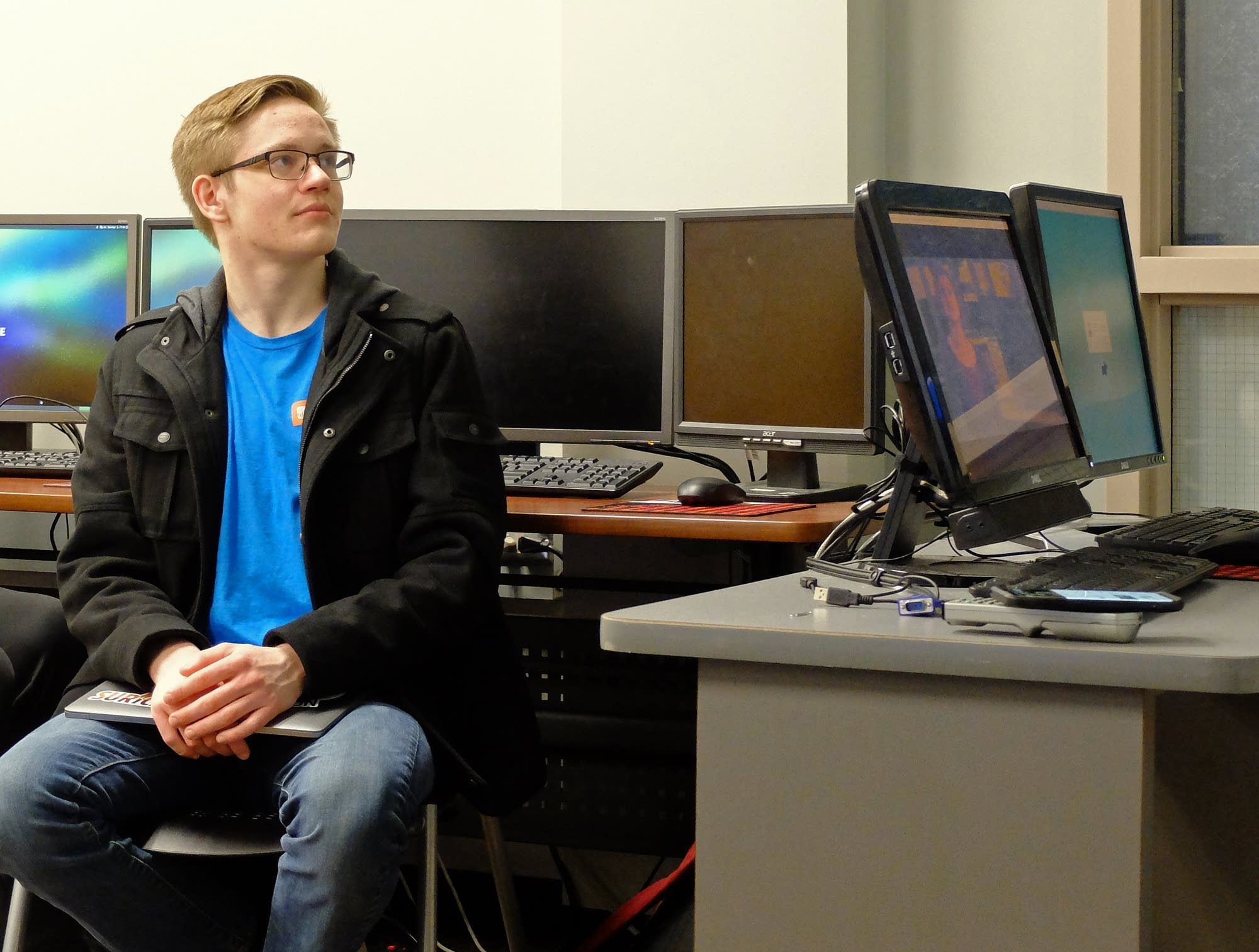 NDSU student Michael Gibbons listens during a cyber security class.