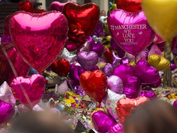 Balloons and floral tributes in St. Ann's Square, Manchester
