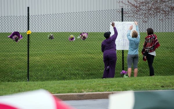 Fans pay tribute to Prince outside Paisley Park.