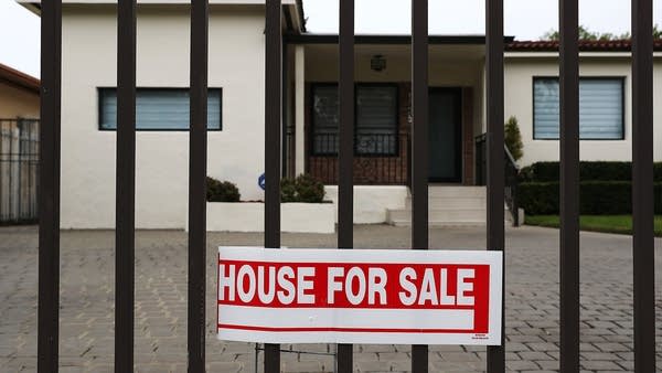 A House For Sale sign is seen outside of a home on January 30, 2019 in Miami, Florida.