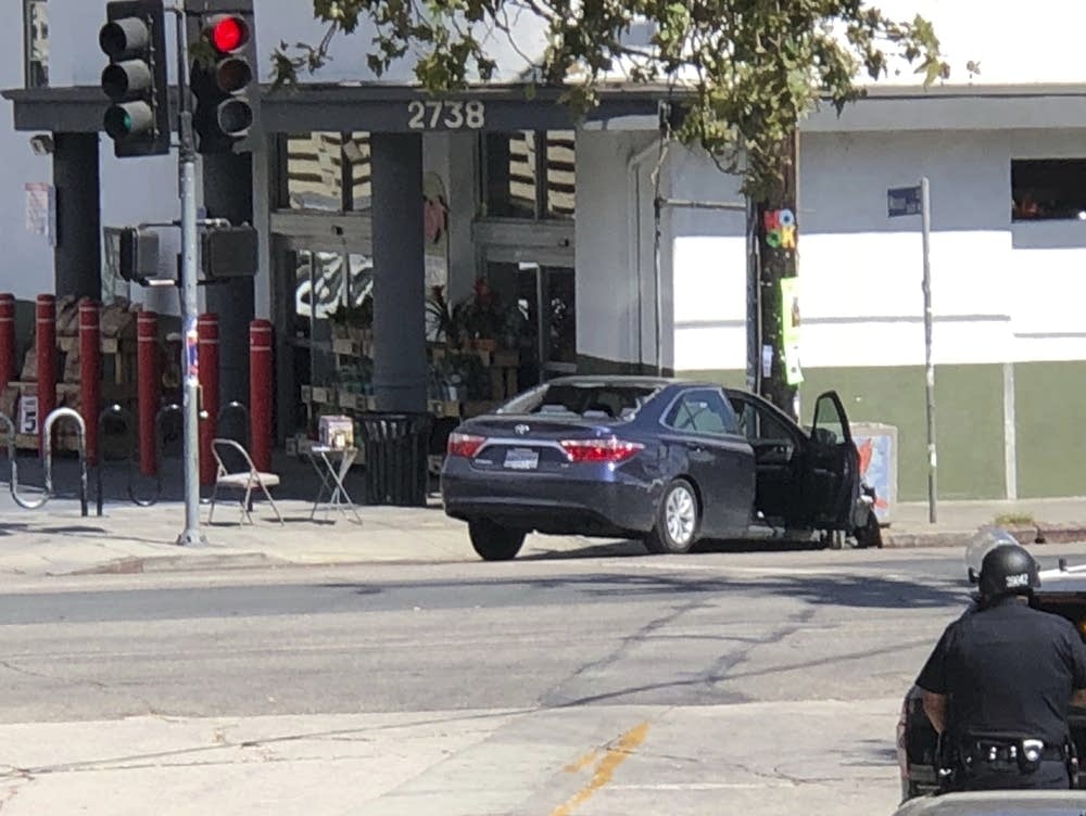 1 dead, dozens of hostages freed after standoff at Los Angeles grocery store MPR News