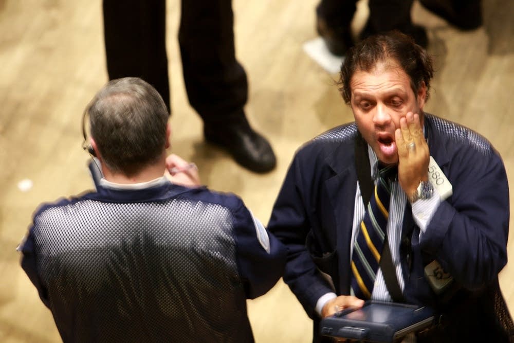 Dow Plunges Below 10,000