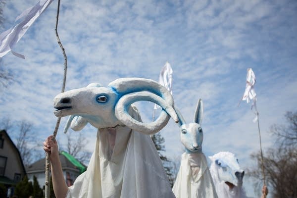 White puppets, representing 'spirit beings'