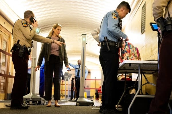 People go through security
