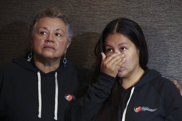 A person speaks during a news conference