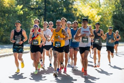Twin Cities Marathon pacers do the math, carry the flag and help runners reach their goals