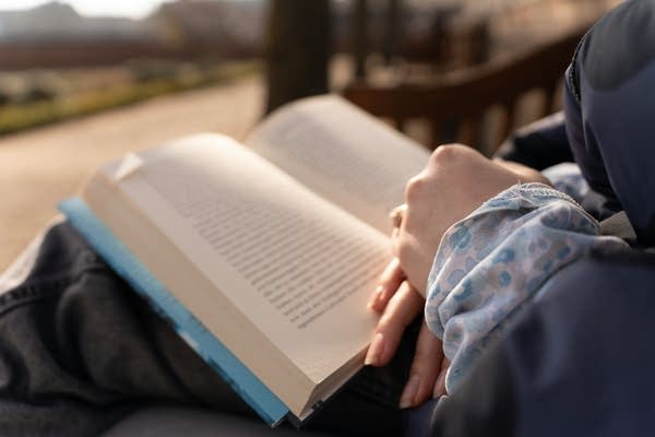 book in a reader's lap