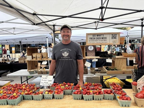 A man posing for photo at Red River Market