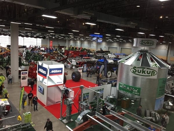 Farmers attend a major farm equipment show in Des Moines, Iowa.