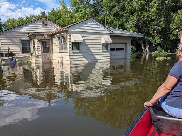 A house sits in high water.