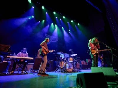 Kurt Vile and the Violators perform onstage.