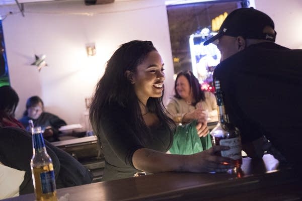 Kaylee Allen bartends at her grandmother's business, Arnellia's.