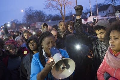 NAACP pres. Nekima Levy-Pounds speaks to the crowd